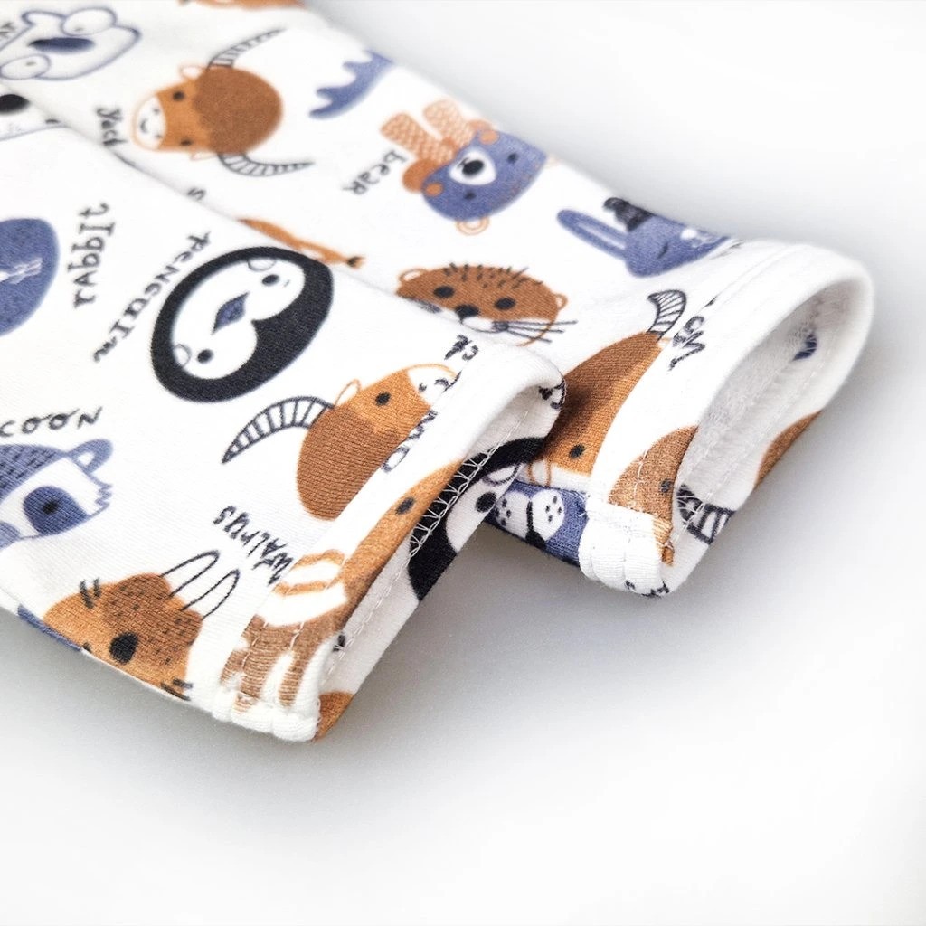 47687-3_tricko-smyk-dr-tisk-outlast-bila-barevna-zviratka-ezgif.com-webp-to-jpg-converter